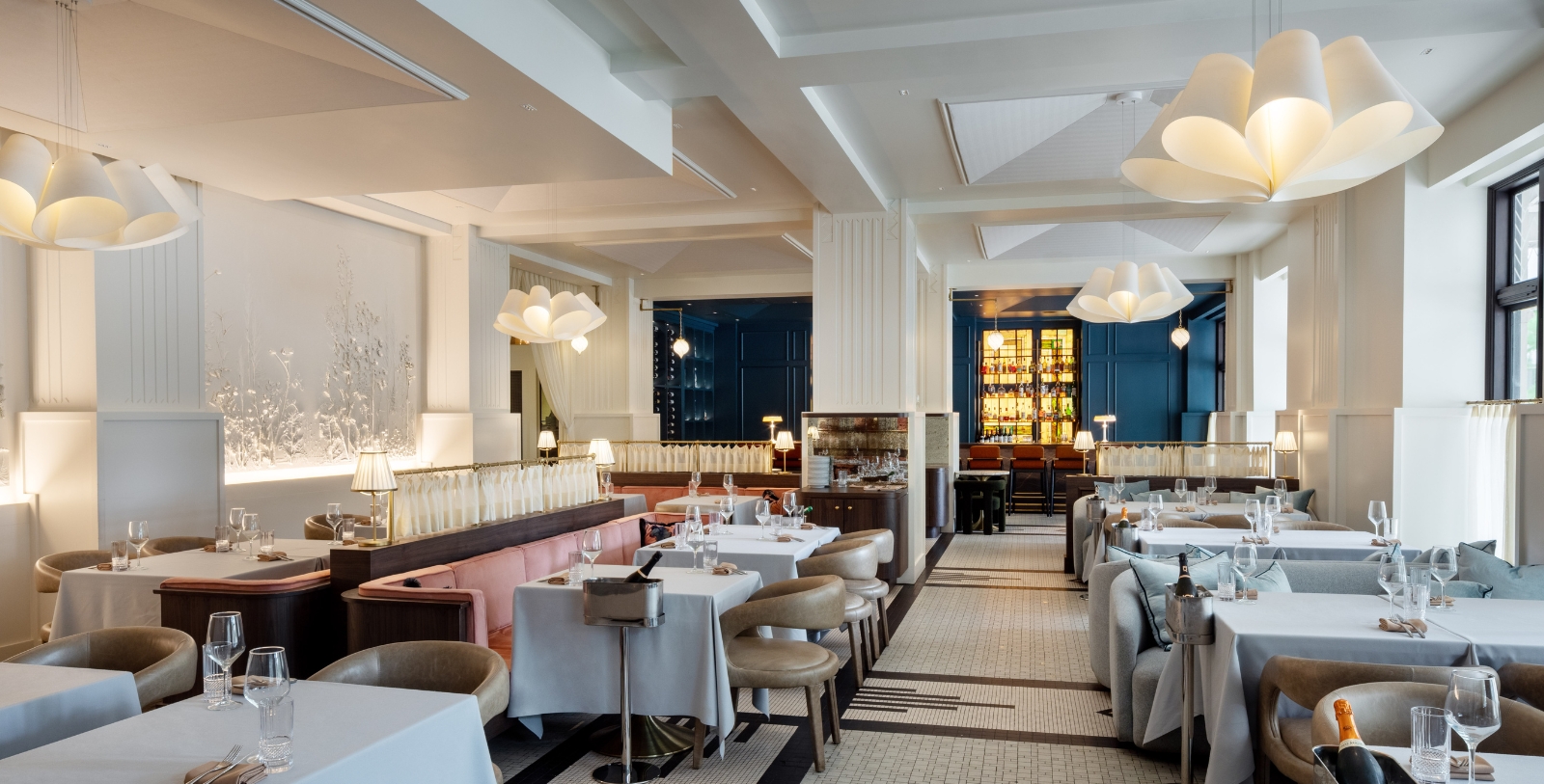 a restaurant with tables and chairs