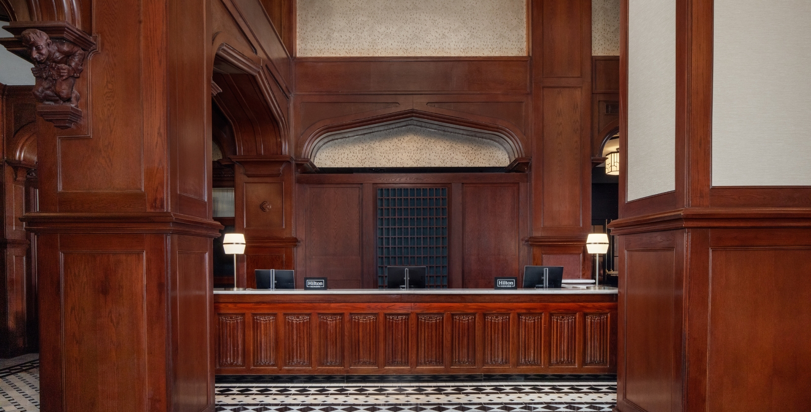 a reception desk in a hotel
