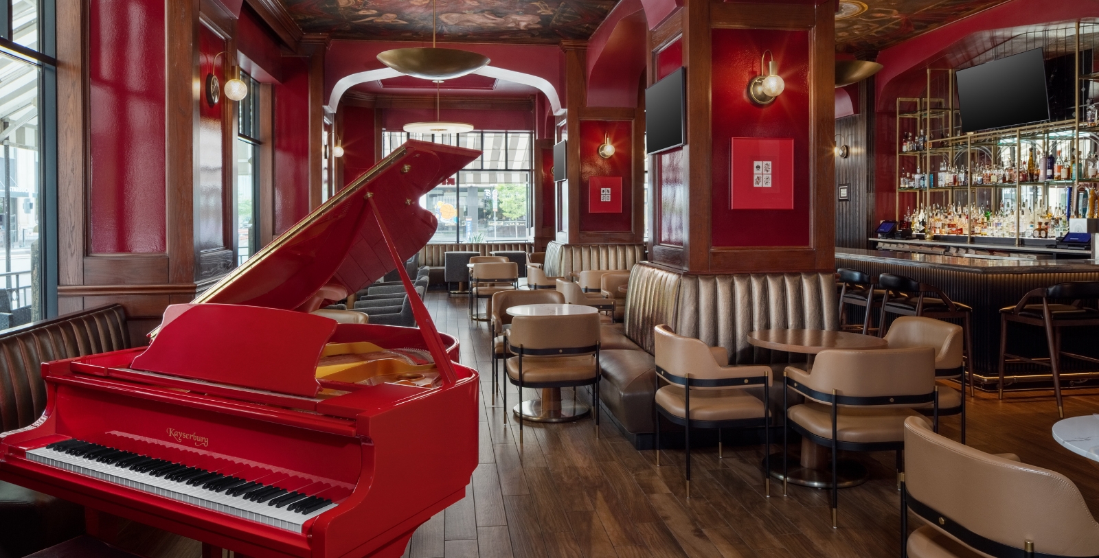 a red piano in a restaurant
