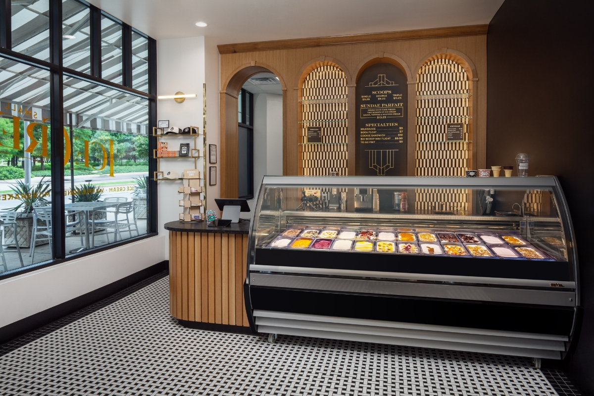 a display case of ice cream in a store
