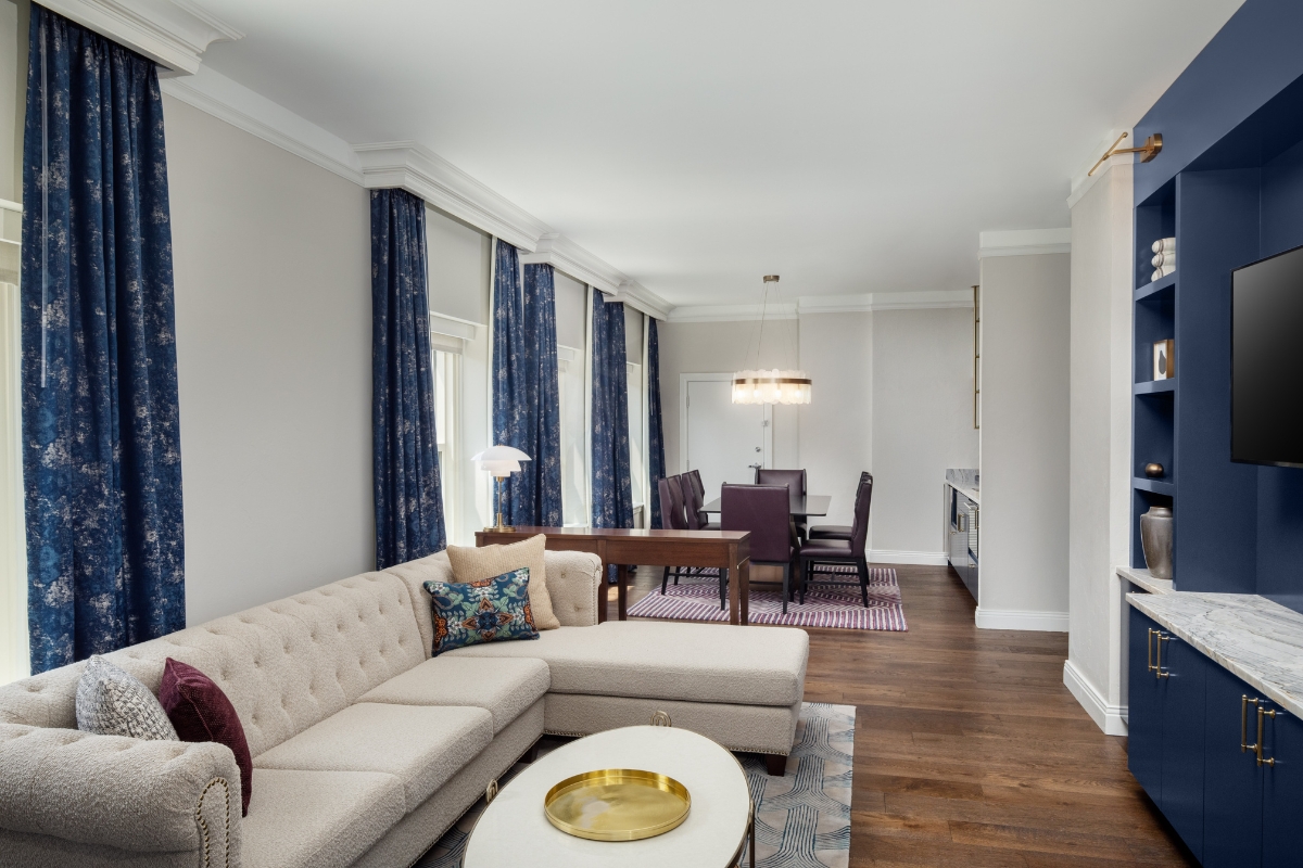 a living room with a couch and table