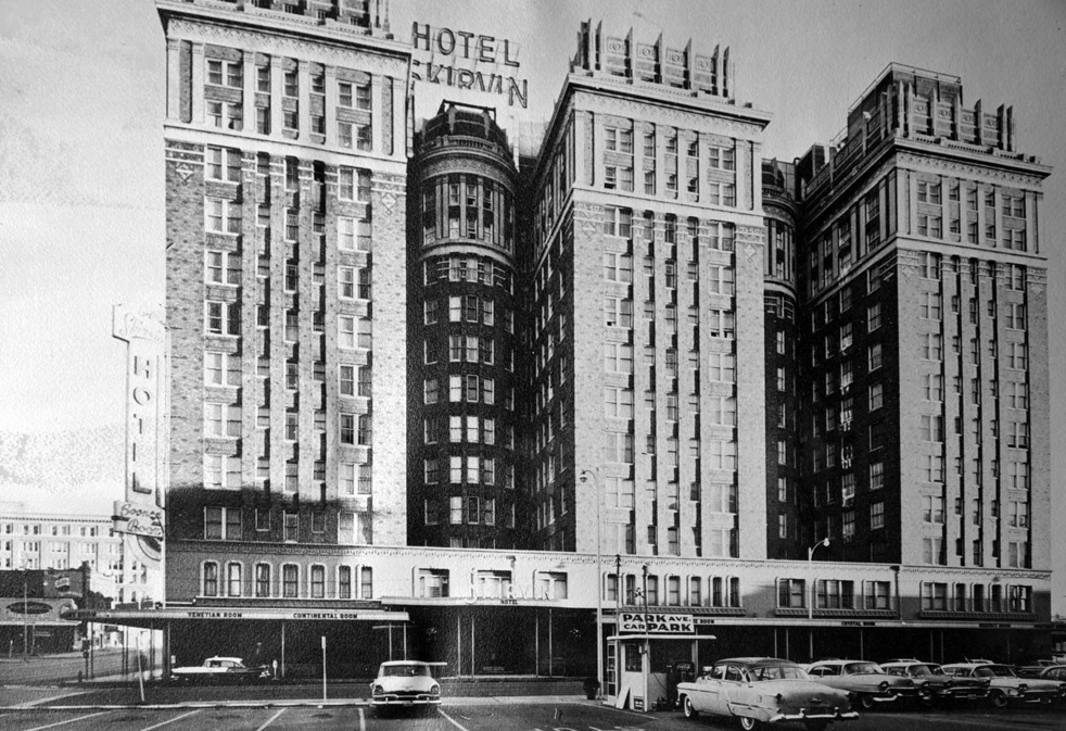 a black and white photo of a hotel
