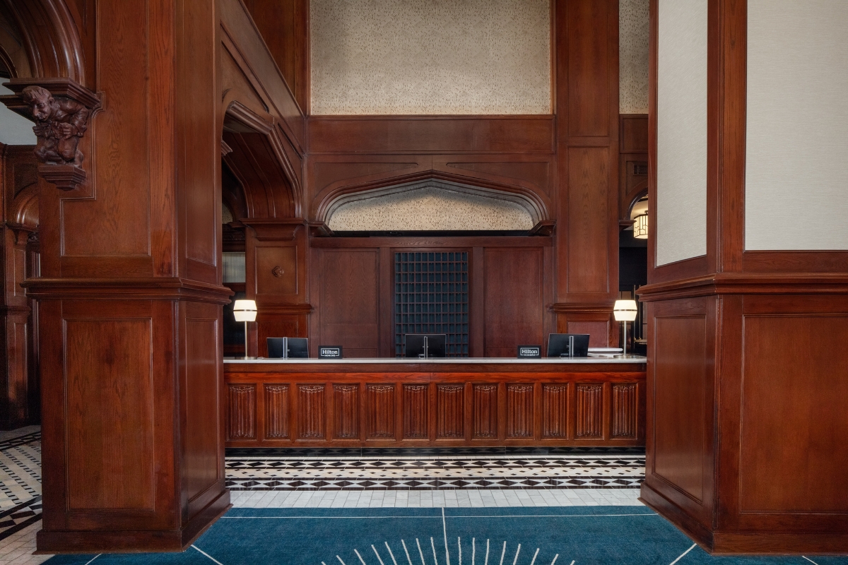 a reception desk in a hotel