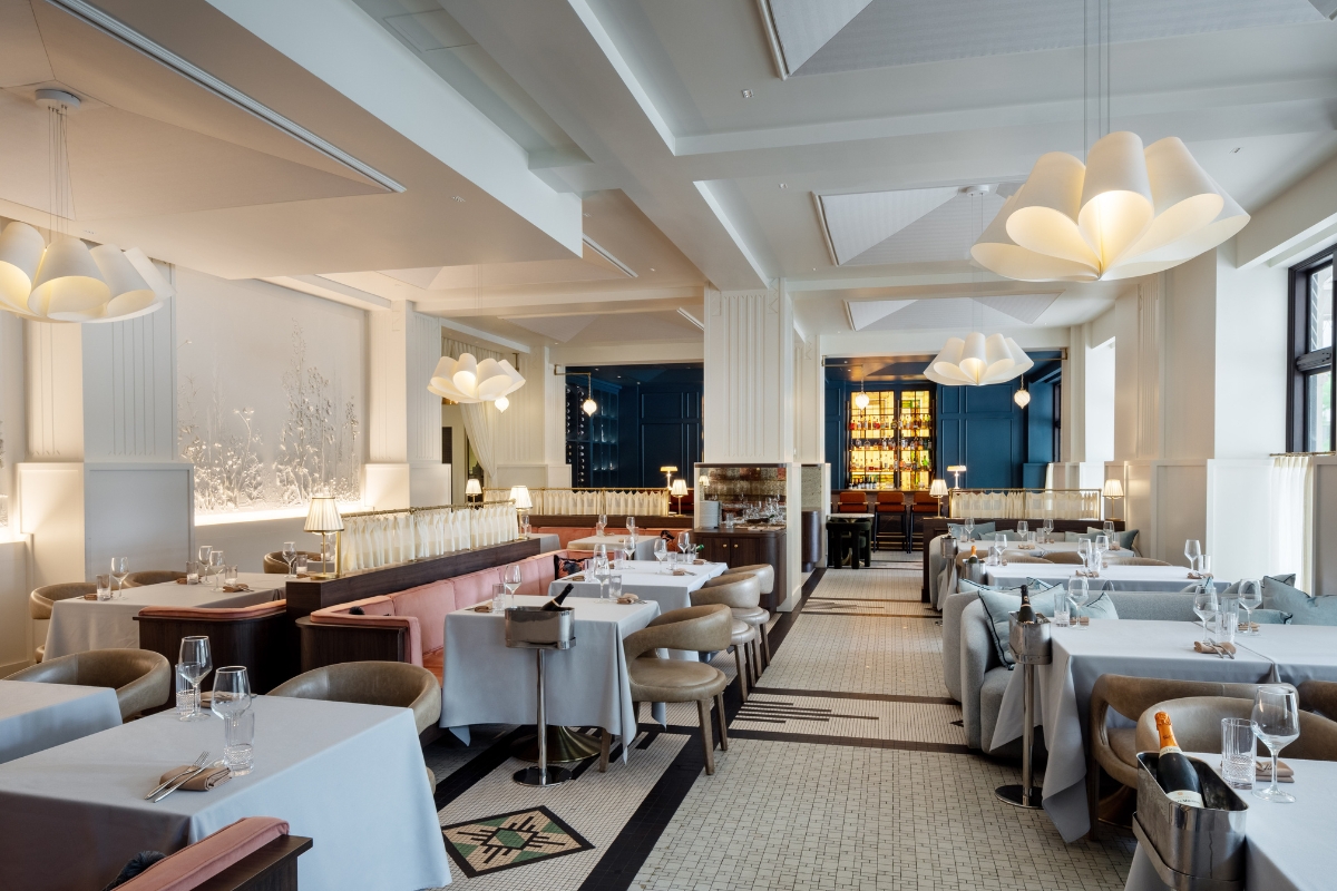 a restaurant with tables and chairs