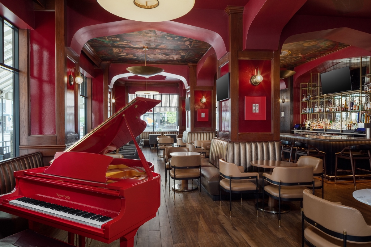 a red piano in a restaurant