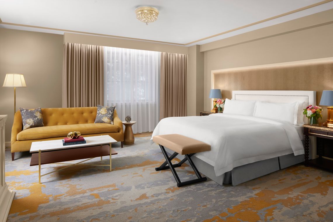a room with a bed and a couch