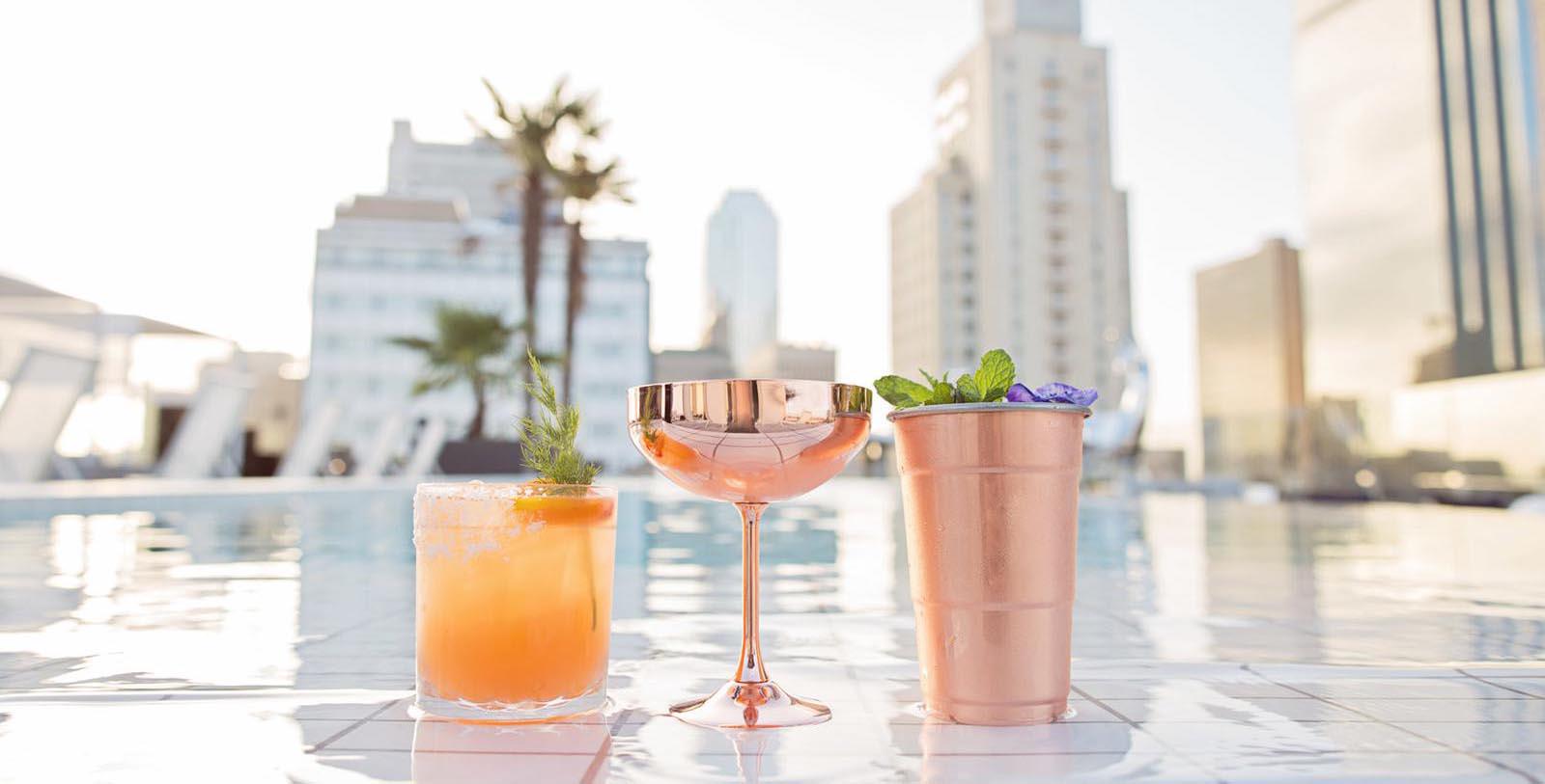 a group of drinks on a pool