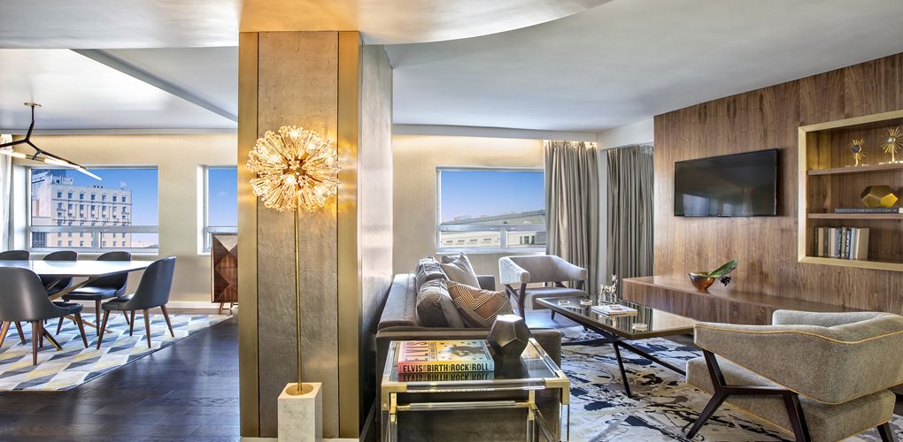 a room with a couch and a coffee table