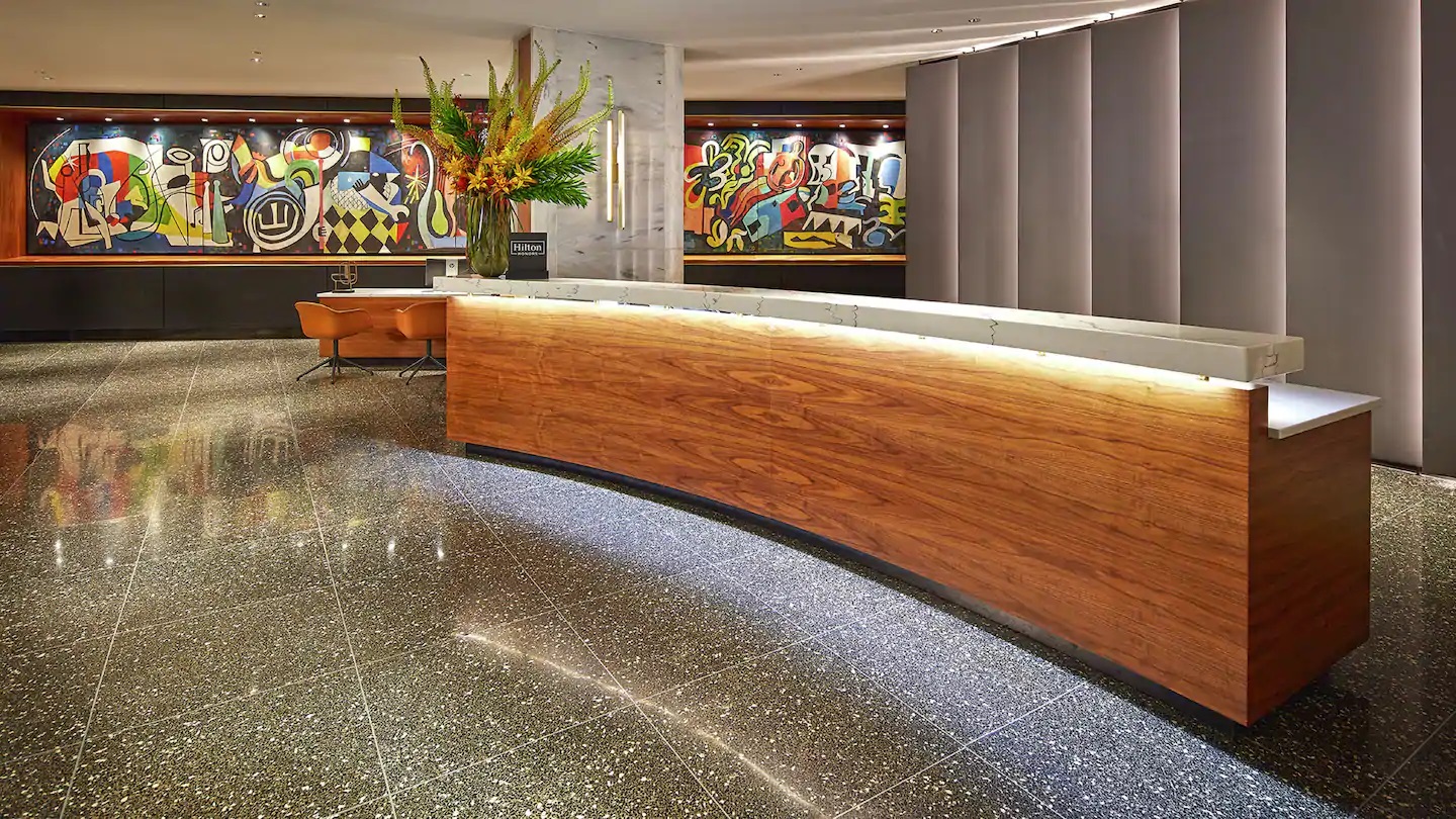 a reception desk in a hotel
