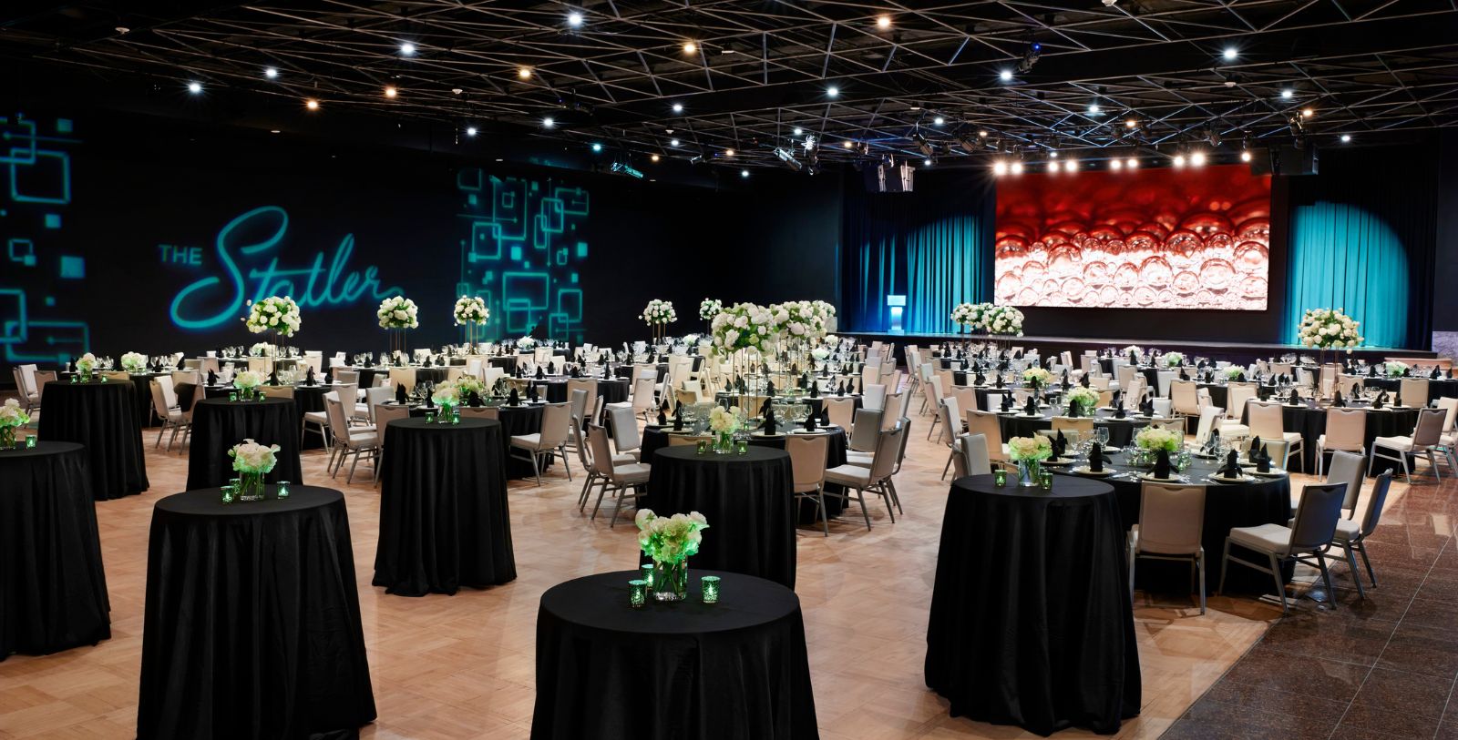 a large room with tables and chairs