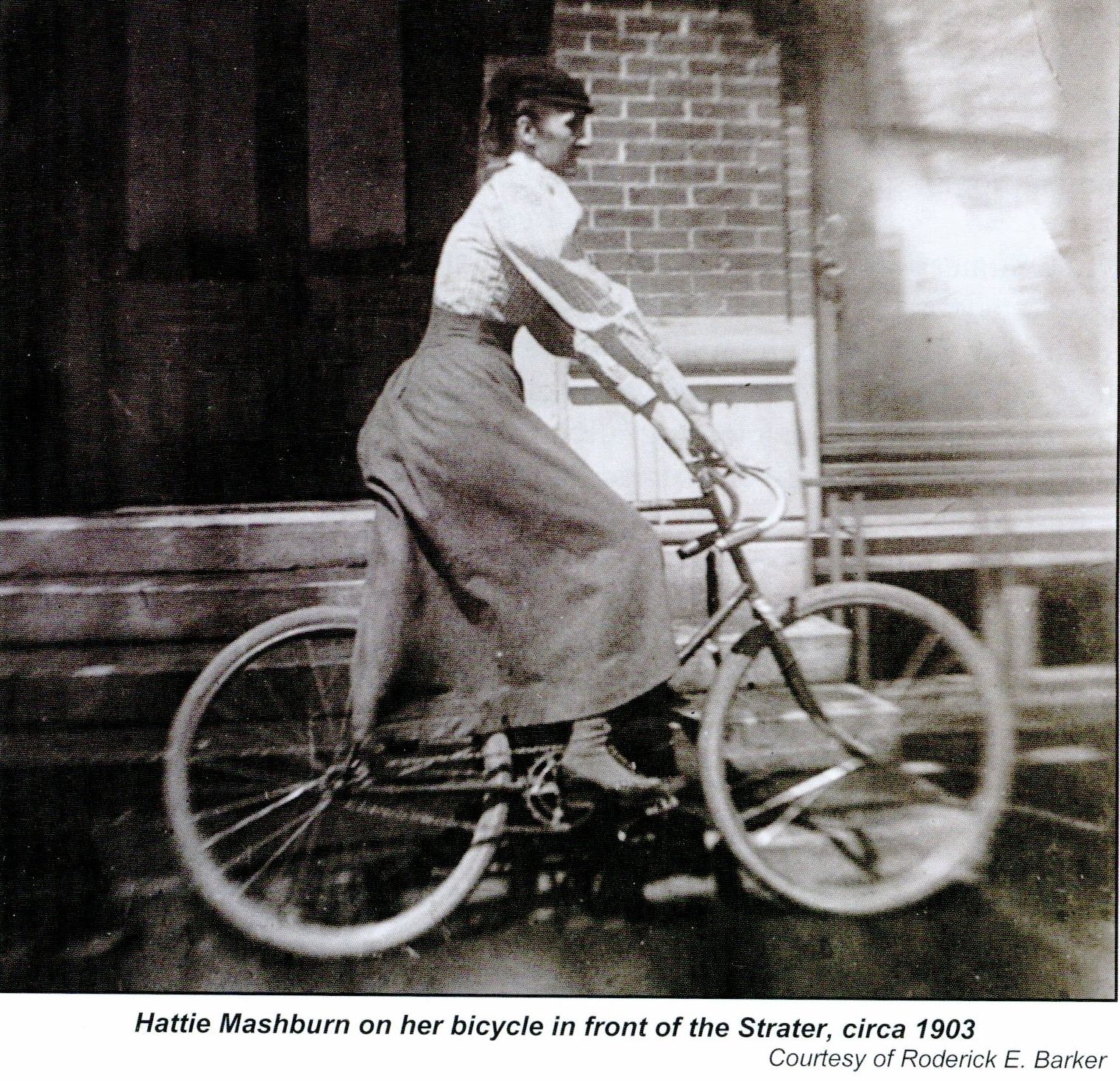 a woman riding a bicycle