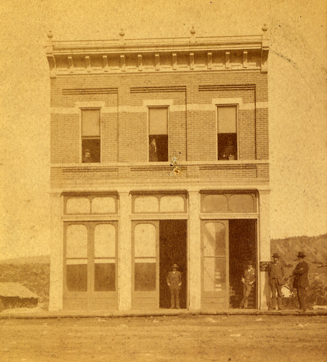 a group of people standing outside of a building