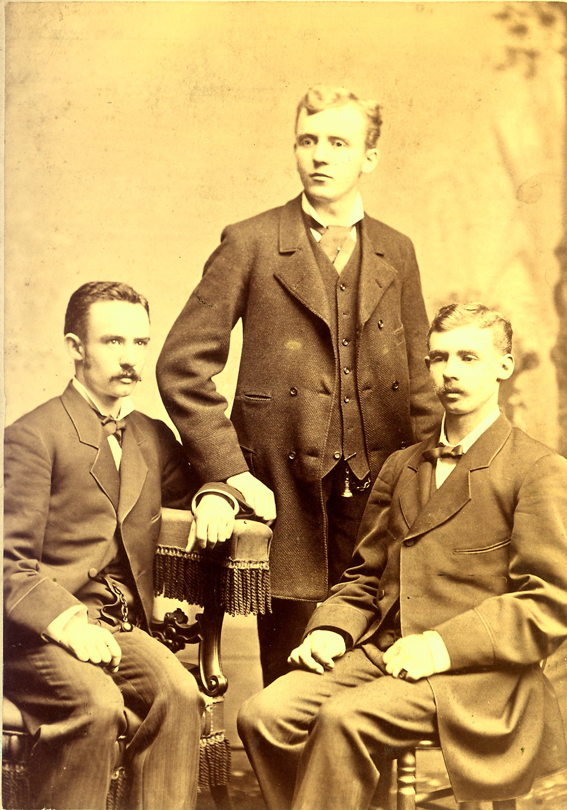 a group of men posing for a photo