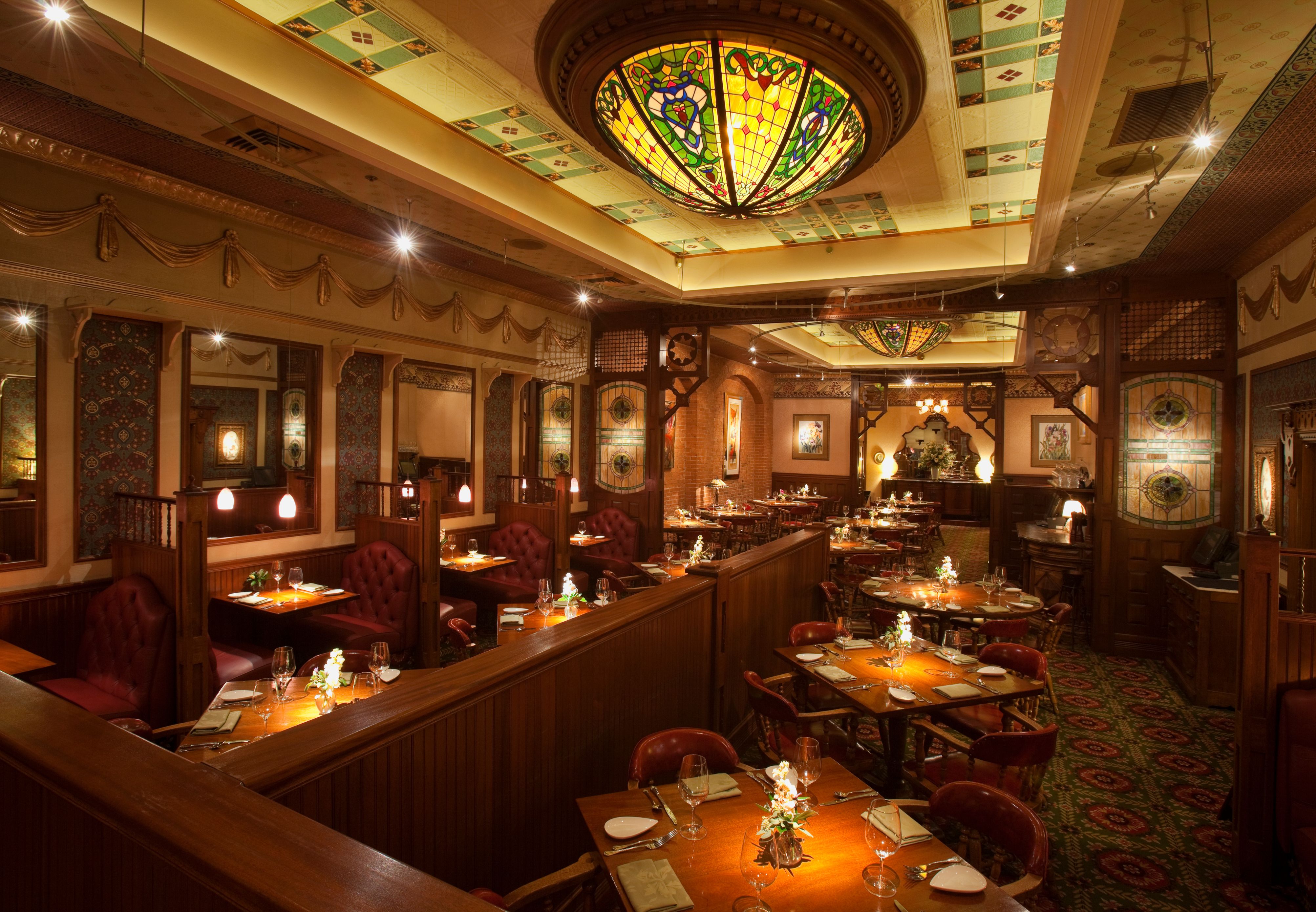 a restaurant with tables and chairs