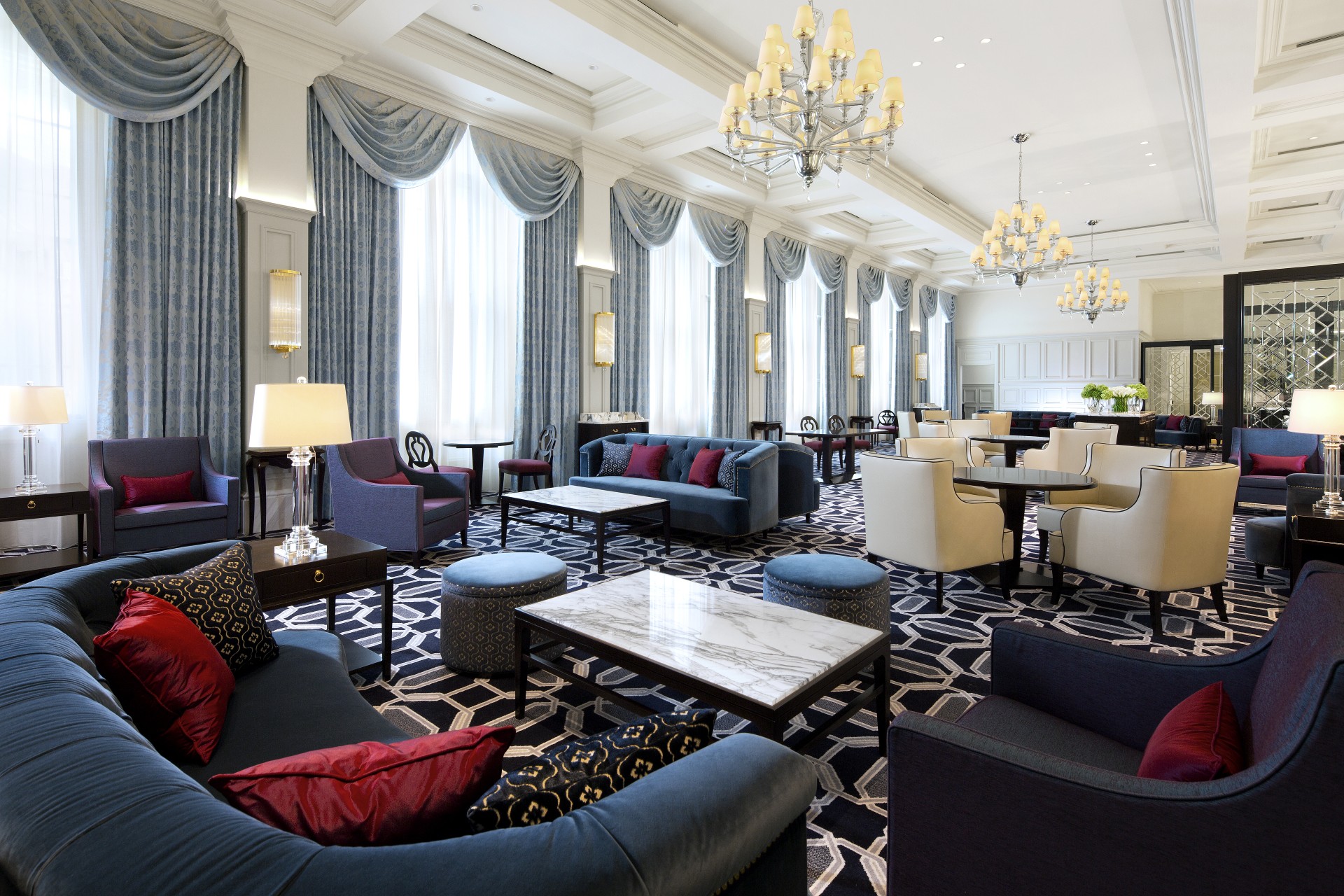 a room with couches and tables