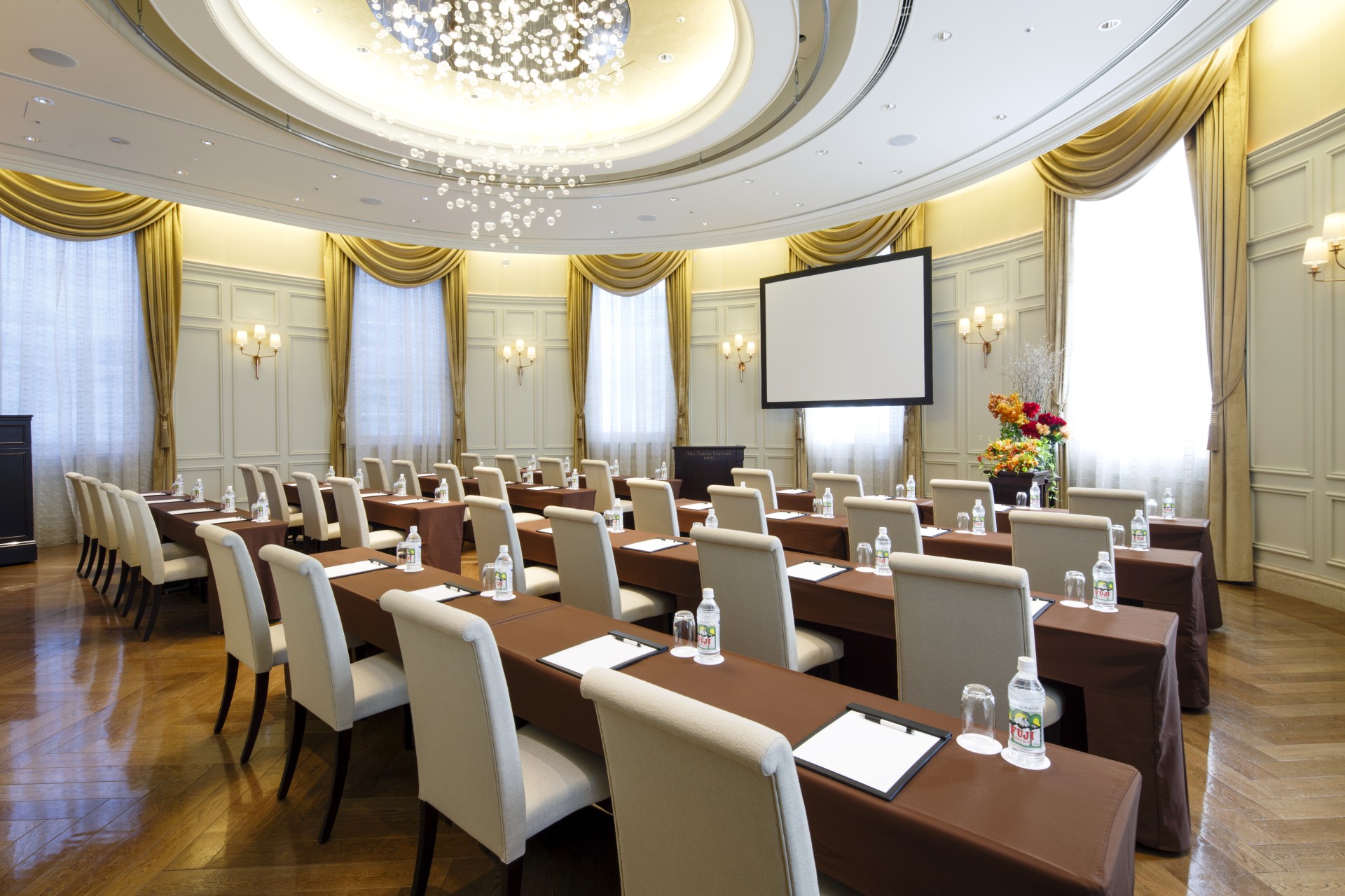 a room with tables and chairs