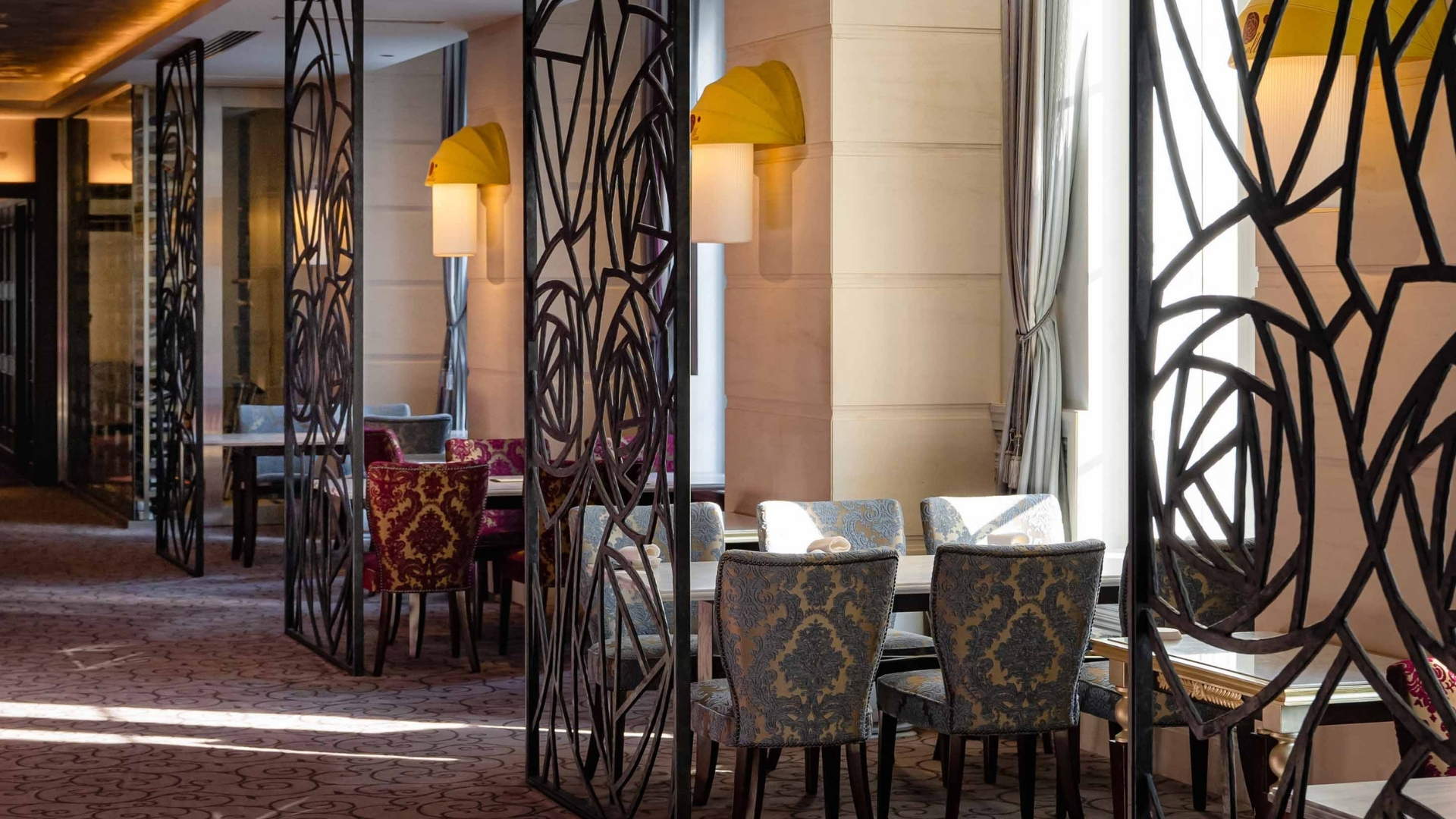 a room with a table and chairs