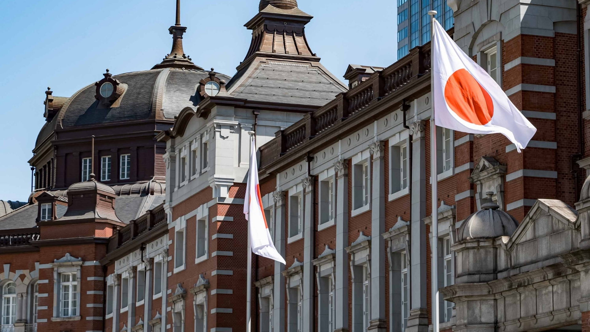 flags on the side of a building