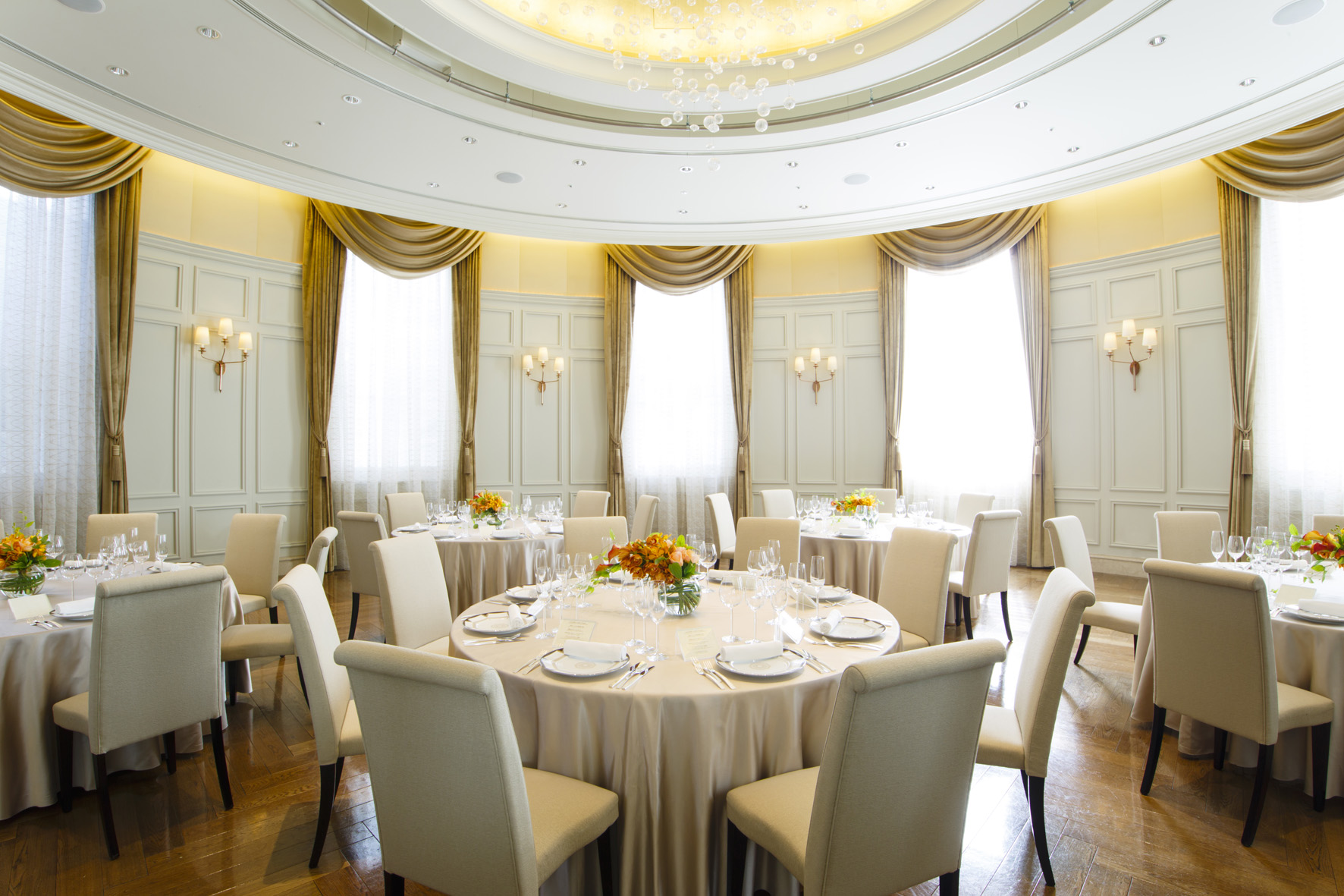 a room with tables and chairs
