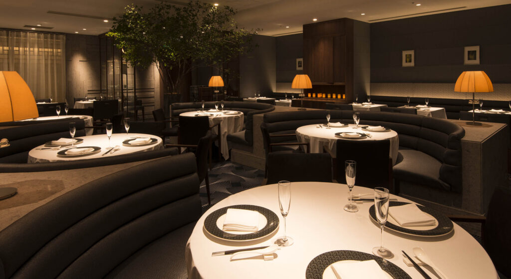 a room with tables and chairs