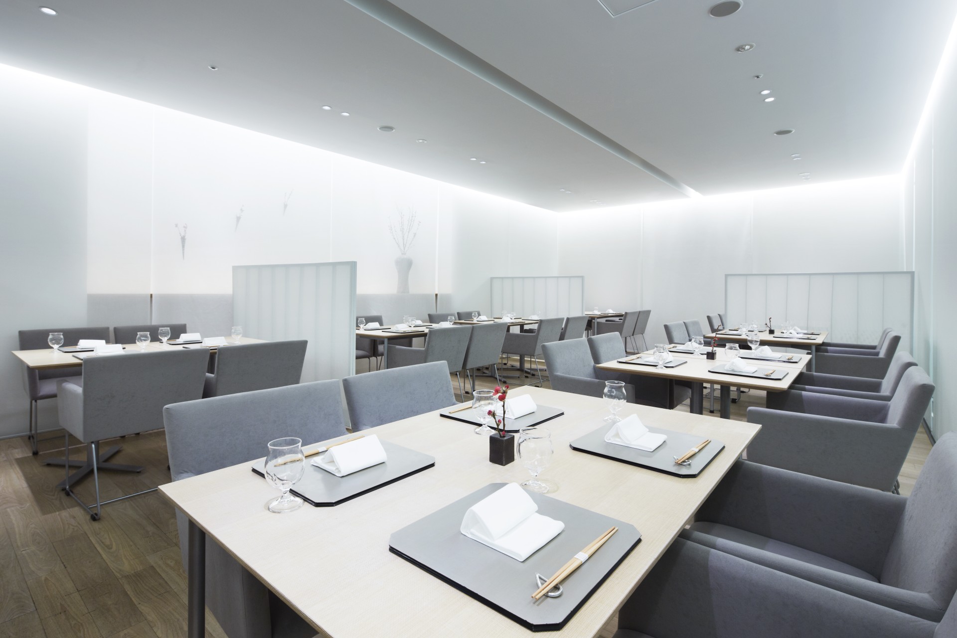 a room with tables and chairs