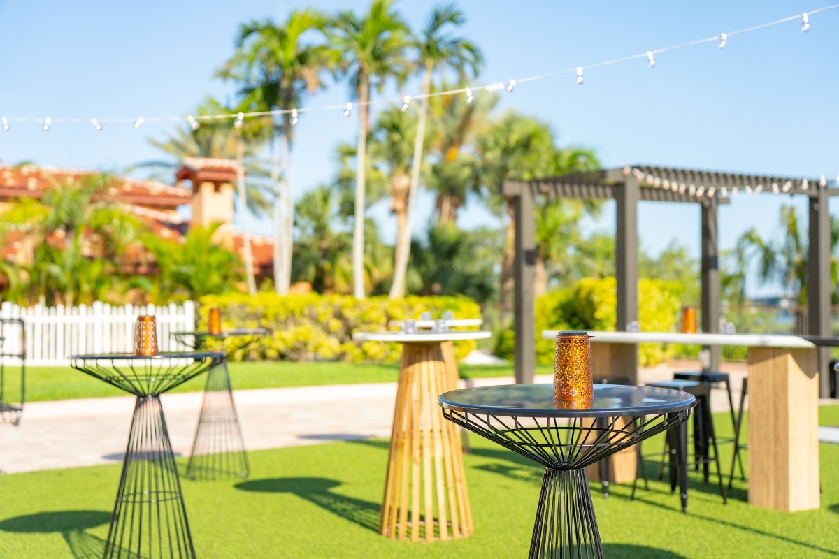 tables and chairs on a lawn