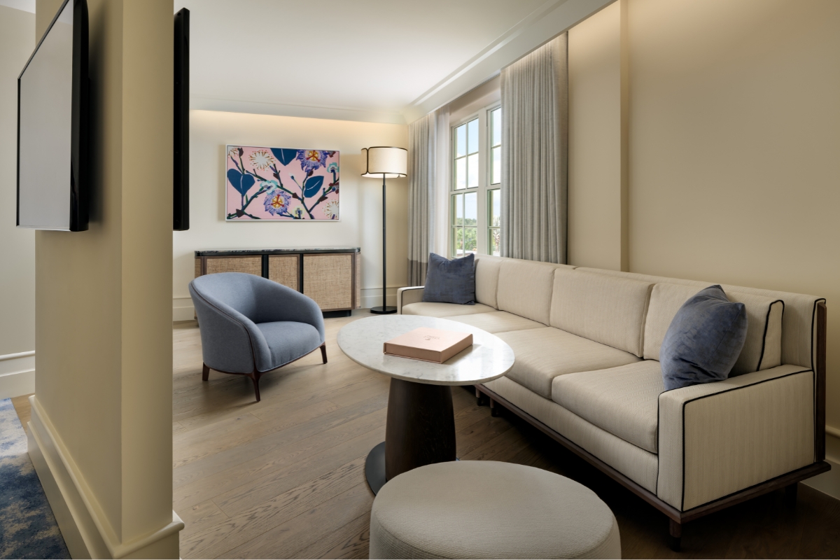 a living room with a couch and a table
