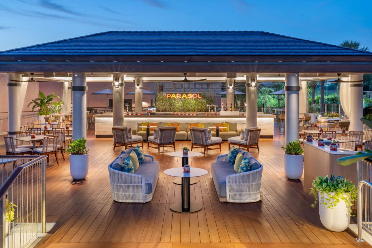 a patio with a table and chairs