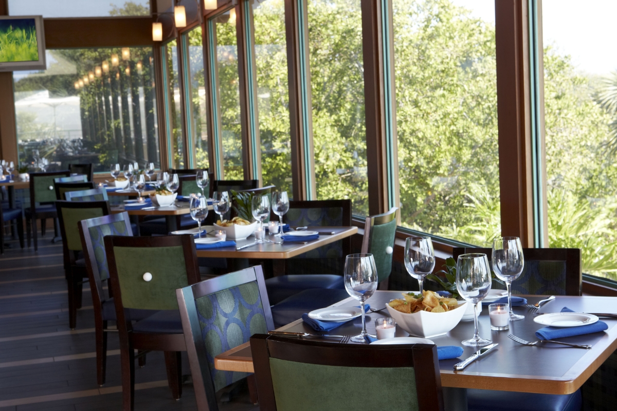 a restaurant with tables and chairs