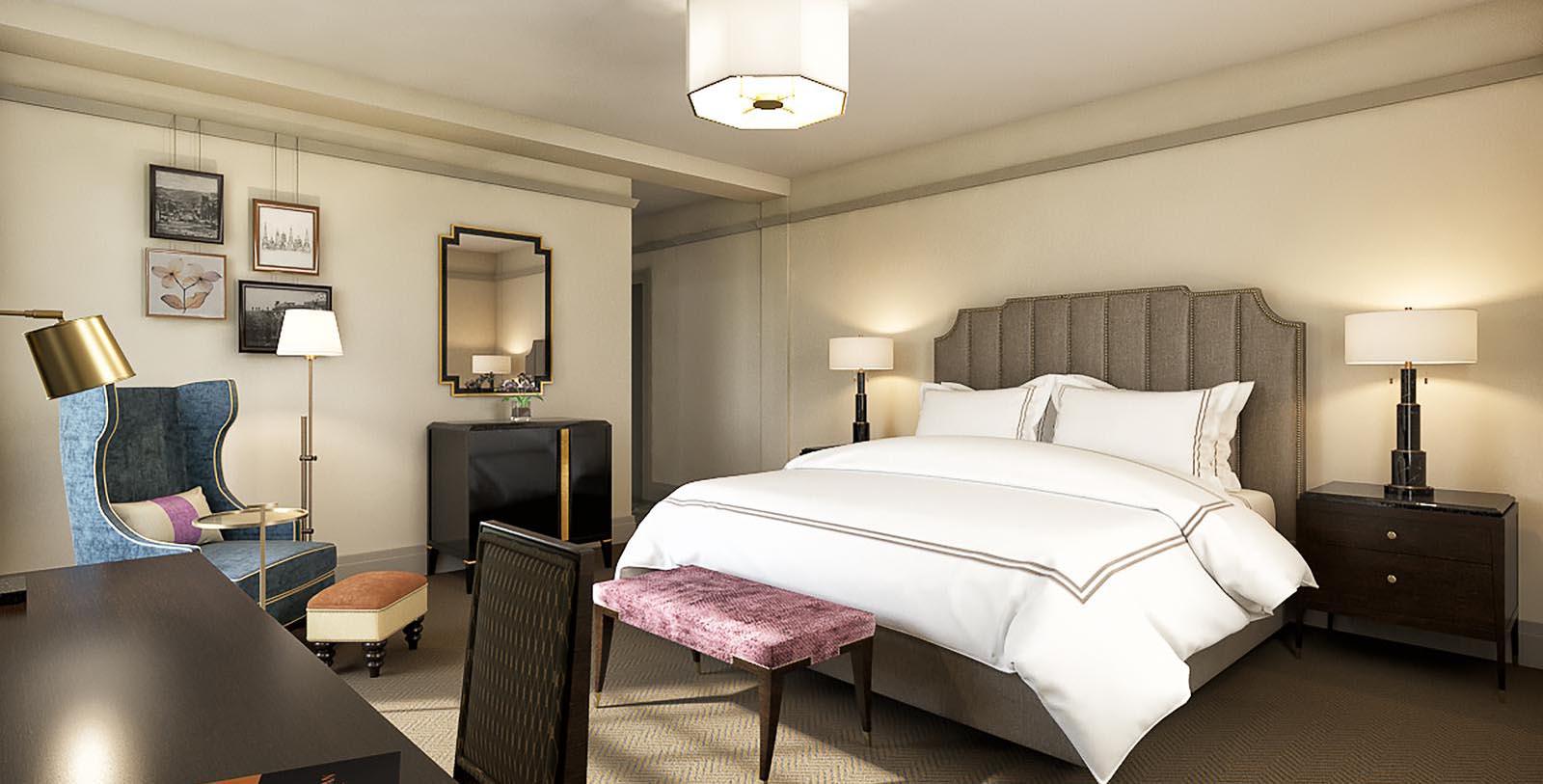 a bedroom with a bed and a chair