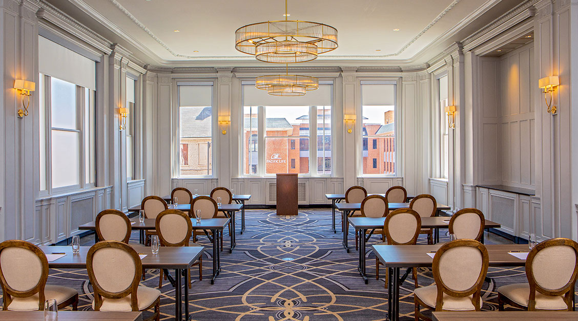a room with tables and chairs