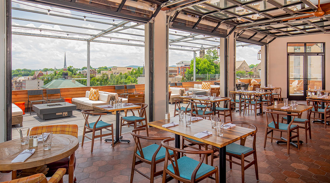 a restaurant with tables and chairs