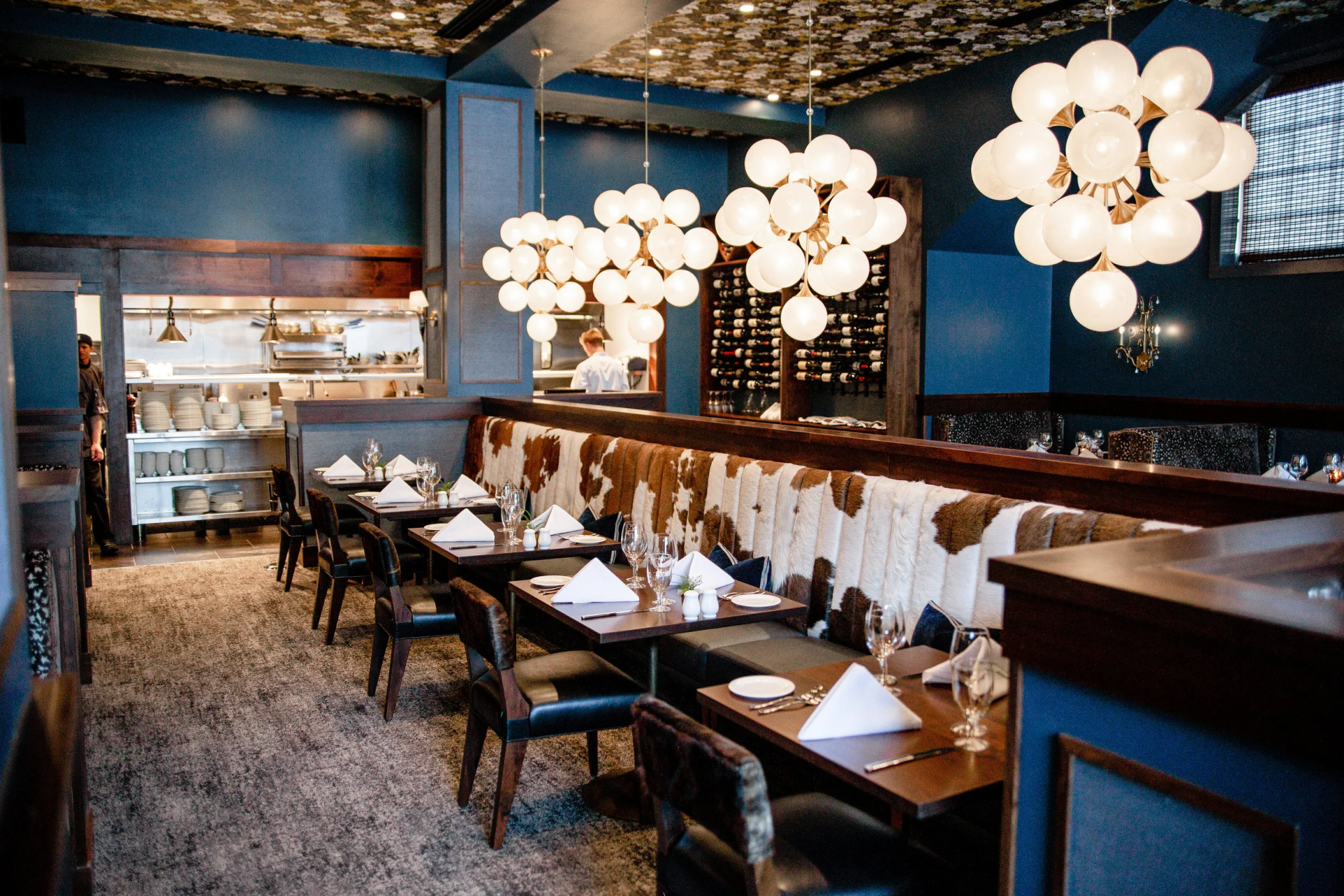 a restaurant with a long booth