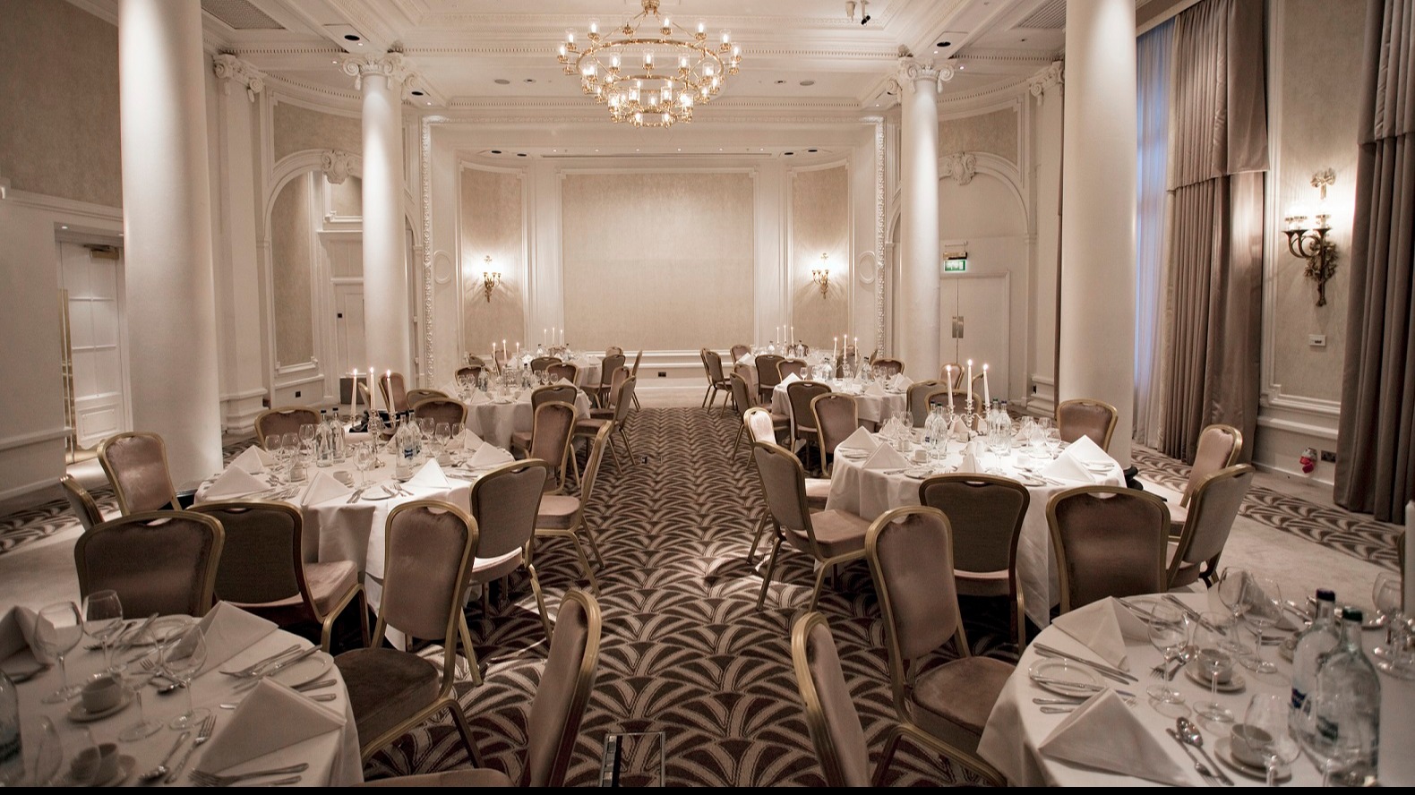 a room with tables and chairs
