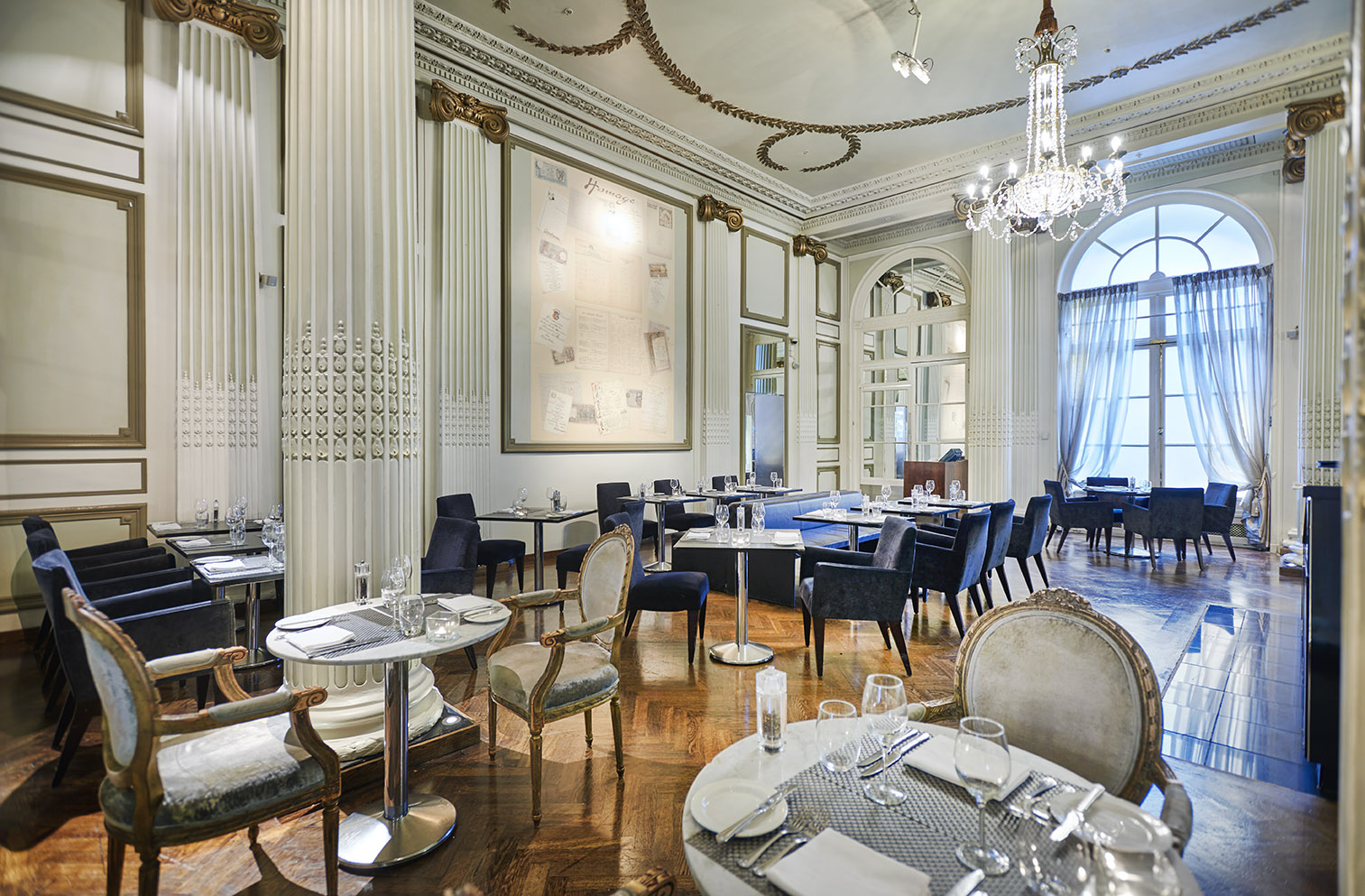 a room with tables and chairs