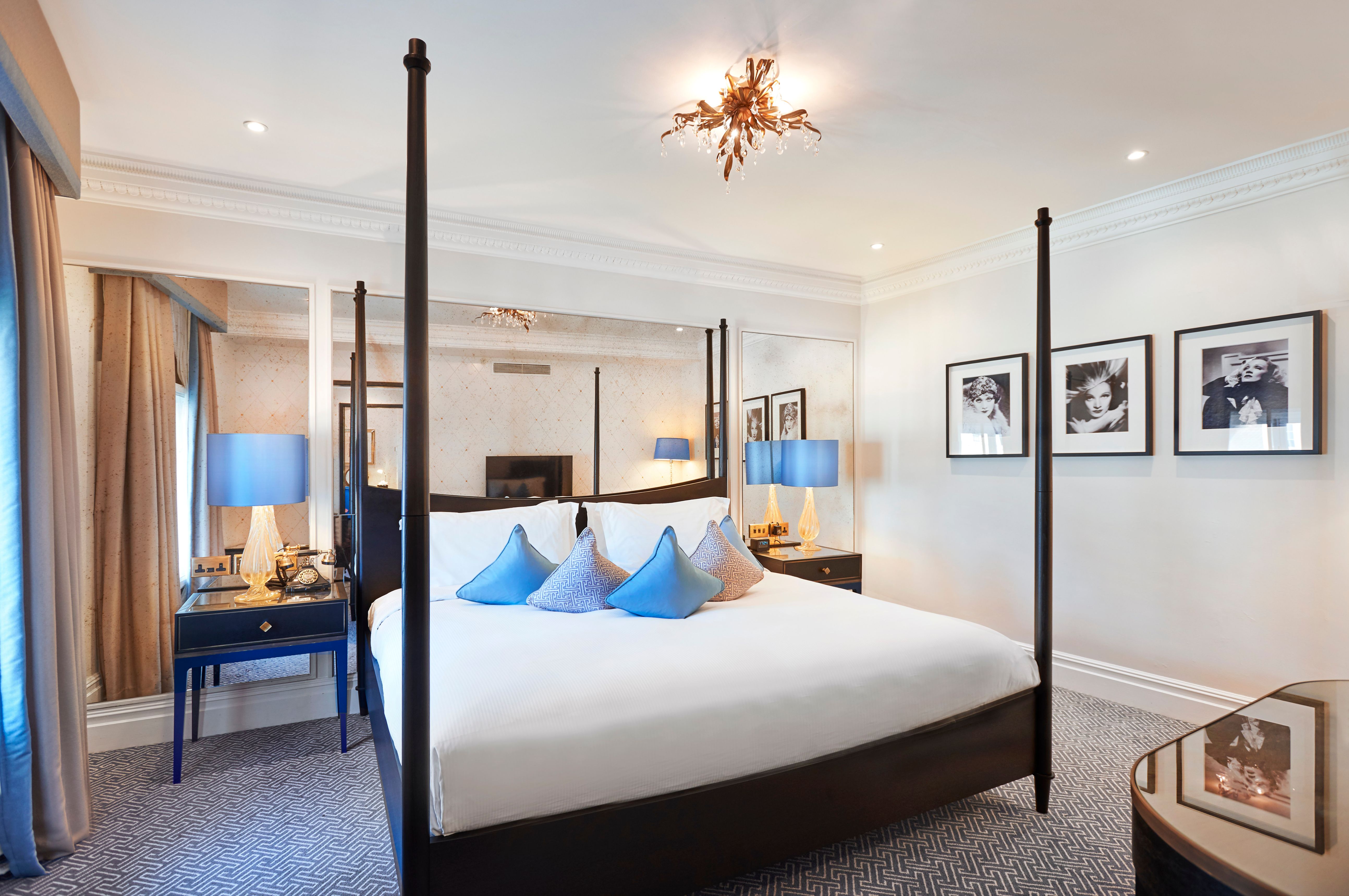 a bed with four poster posts