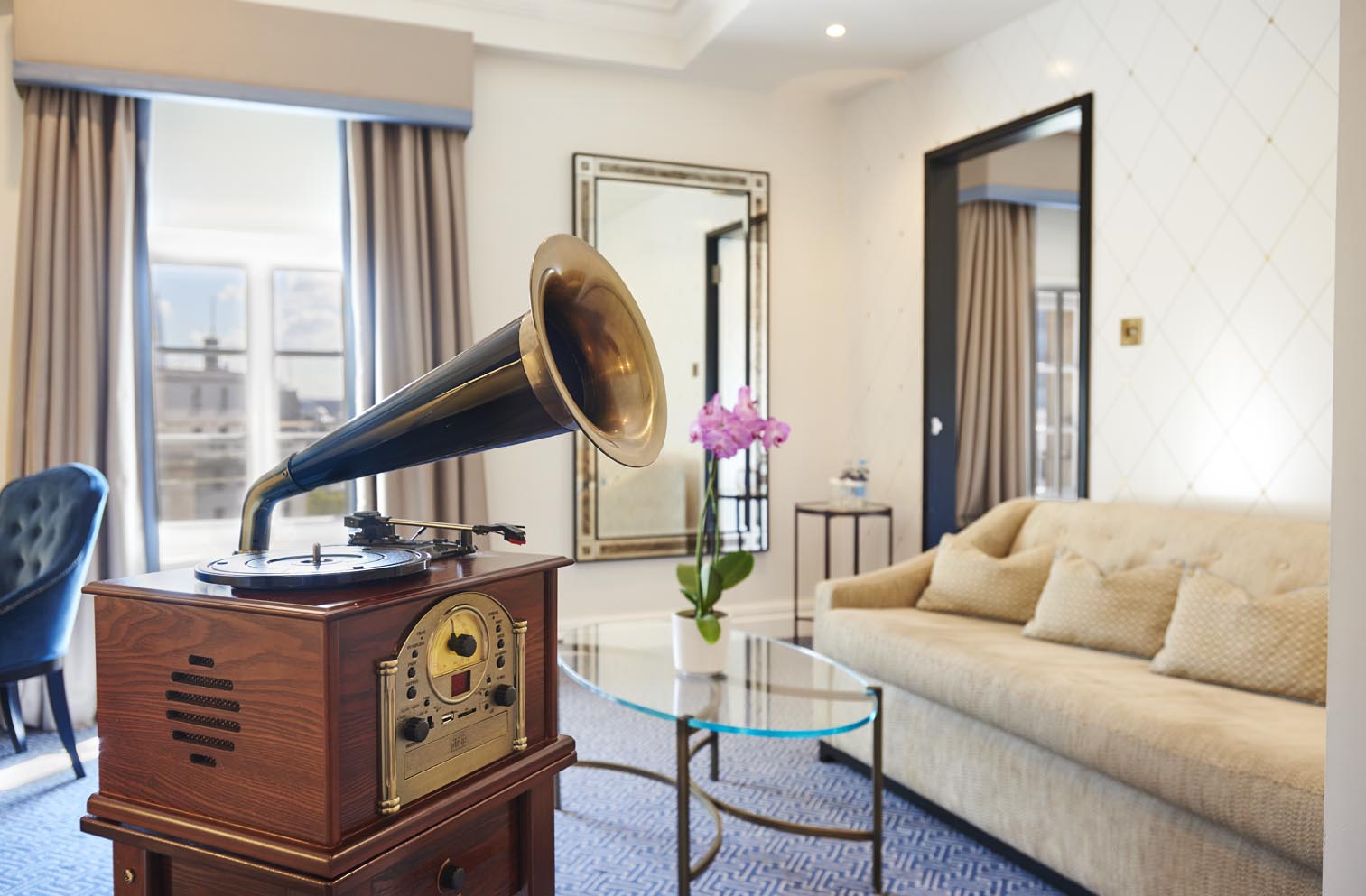 a room with a gramophone and a couch