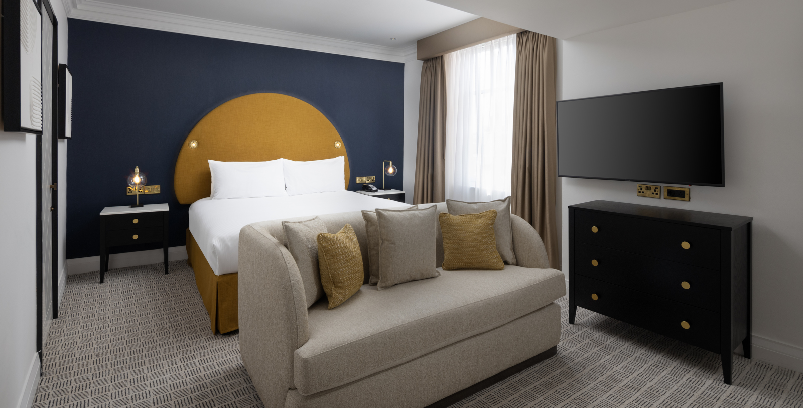a room with a bed and a couch