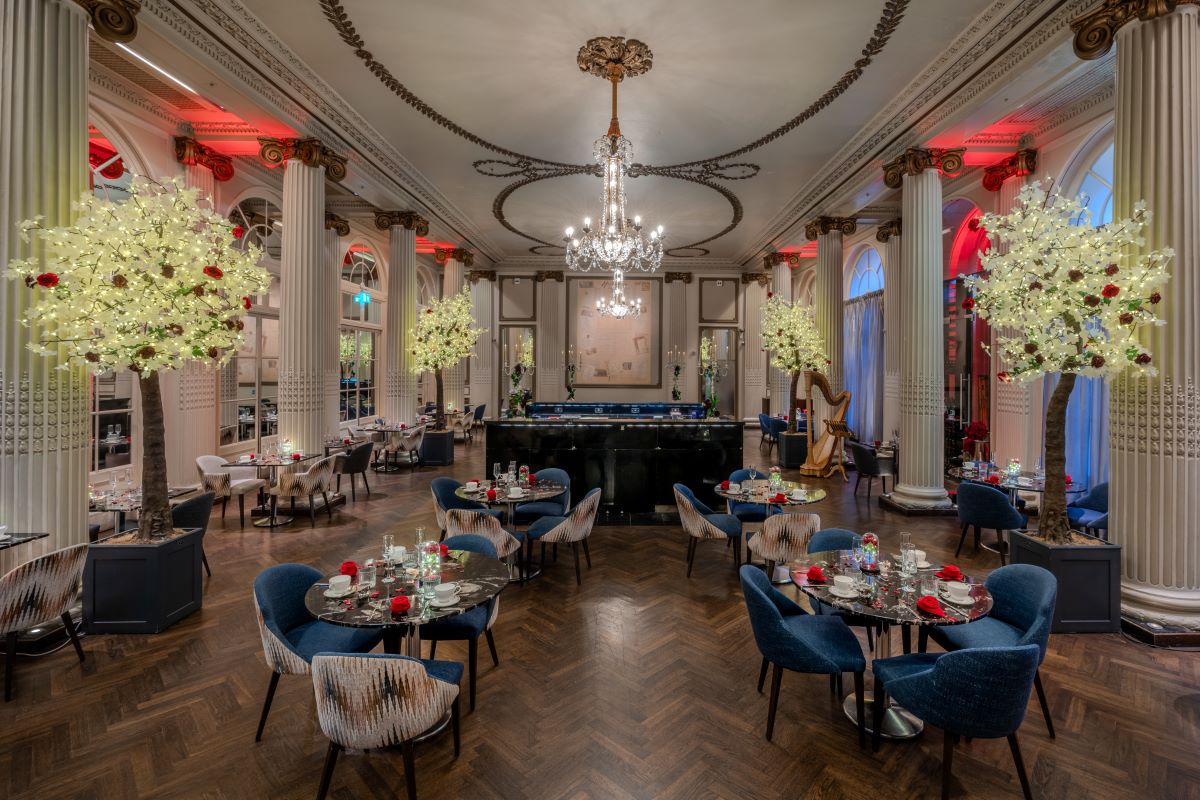a room with tables and chairs