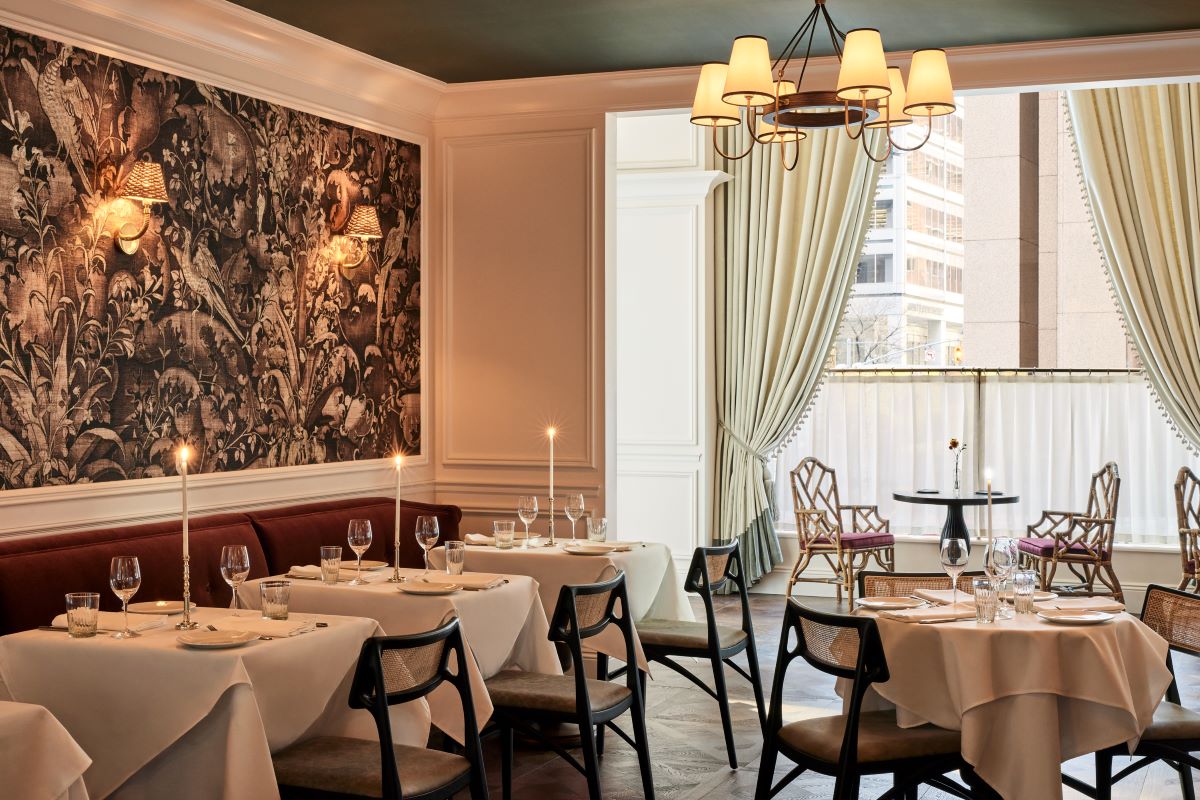 a room with tables and chairs