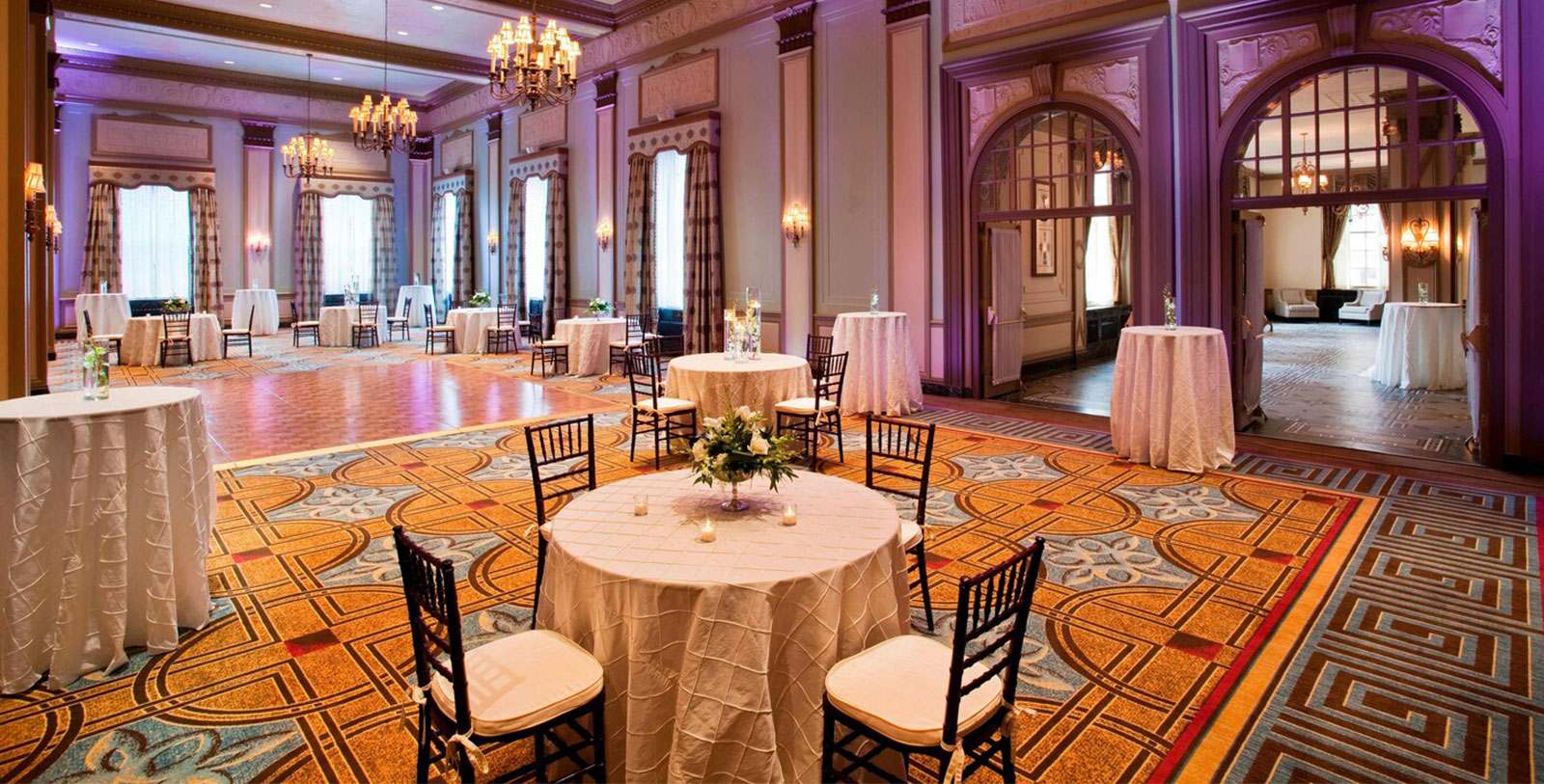 a room with tables and chairs