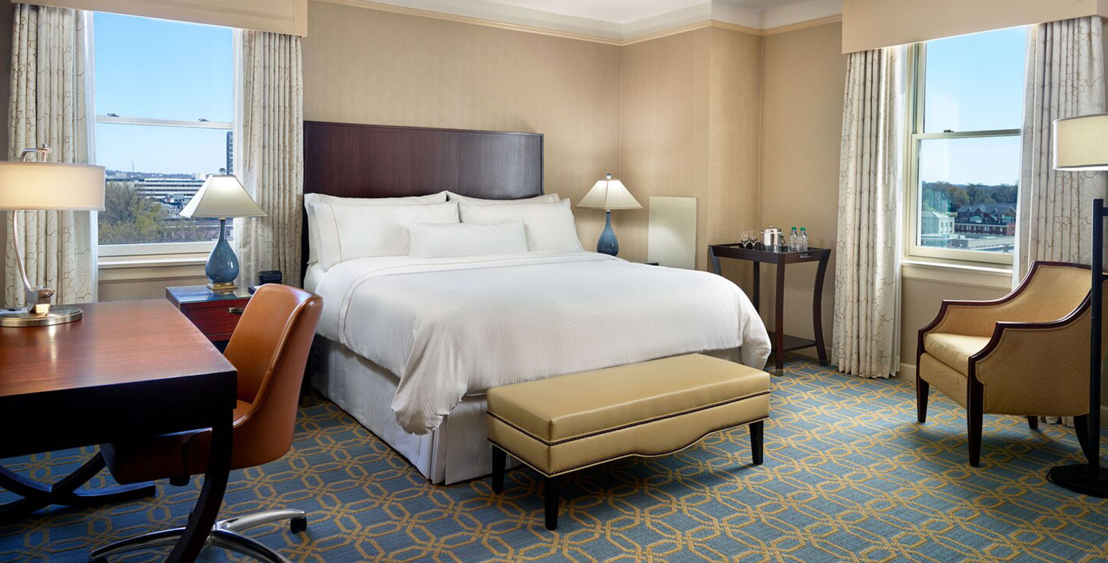 a room with a bed and a chair