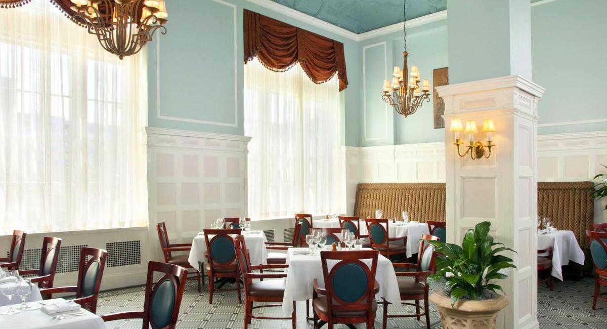 a room with tables and chairs