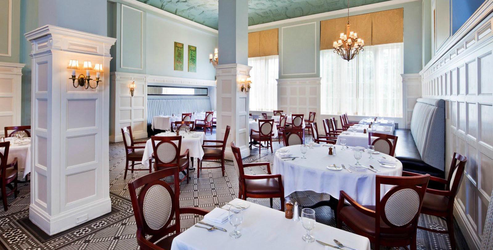 a room with tables and chairs