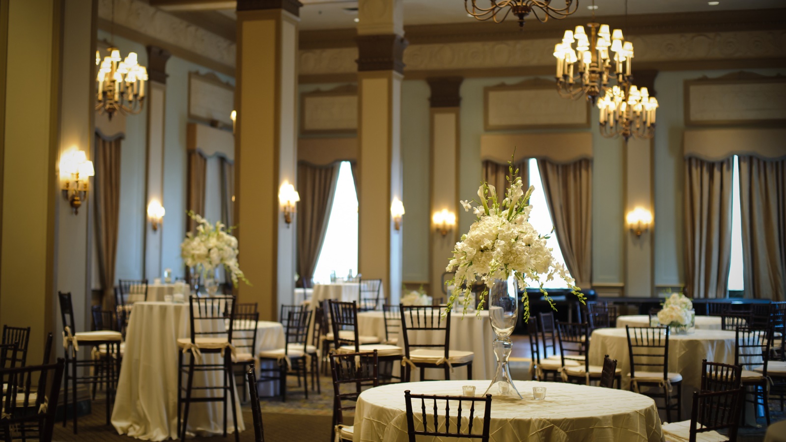 a room with tables and chairs