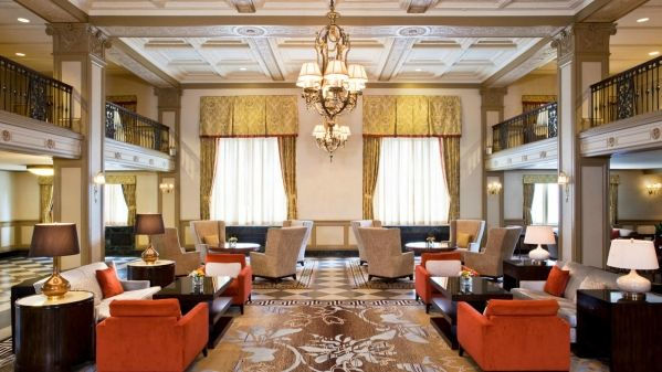 a room with chairs and tables
