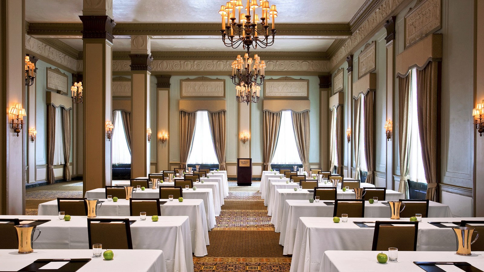 a room with tables and chairs