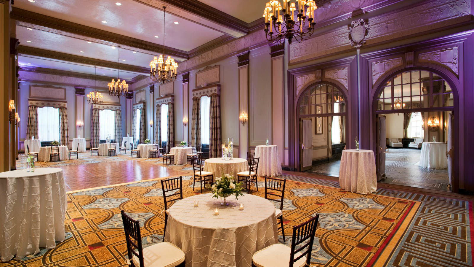 a room with tables and chairs