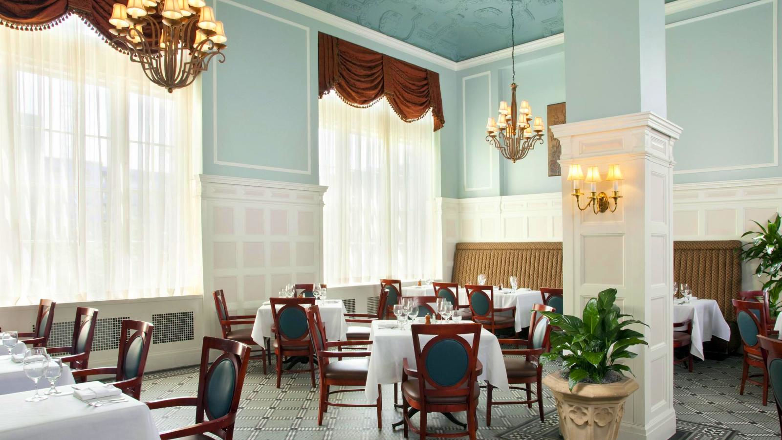 a room with tables and chairs