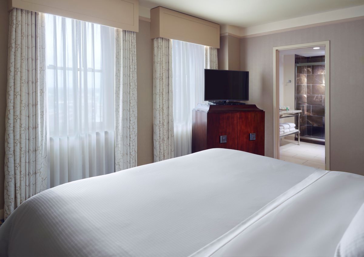a bed in a hotel room
